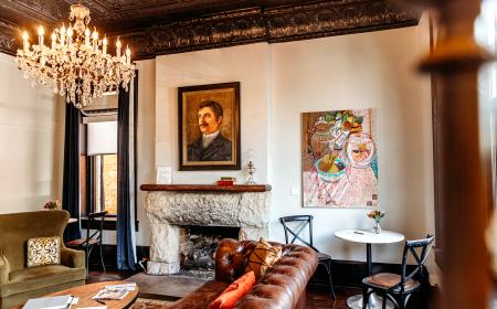 Hotel Giles Parlor, fire place, art on walls, chandler 